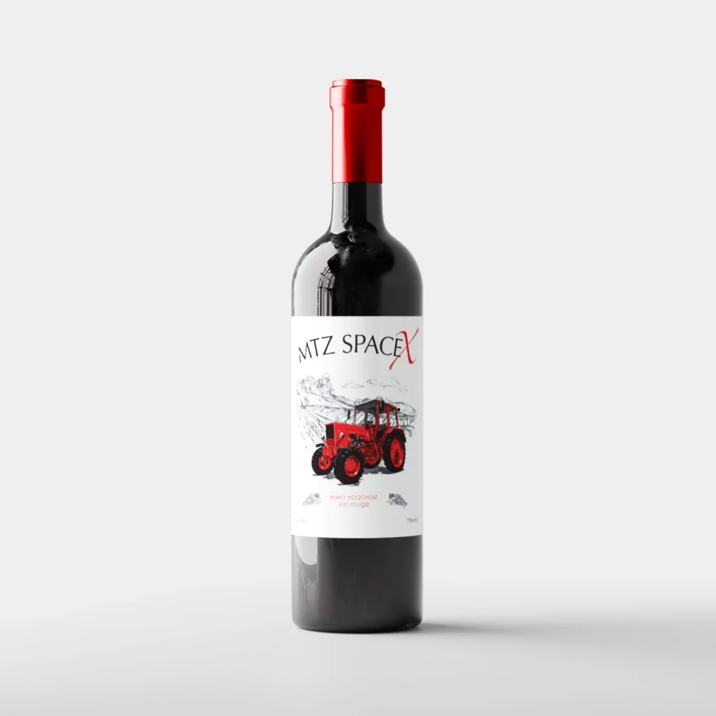 Wine bottle with a red cap and a label featuring a bright red tractor illustration