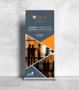 Coris 2023 Symposium gray and orange floor pullout banner